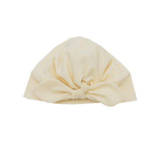 Babyhaube mit Schleife creme