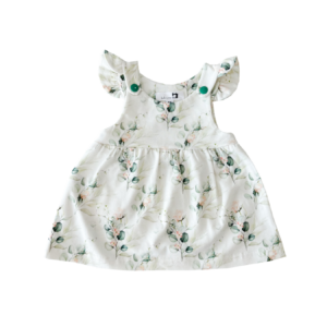 Babykleid mit Flügerl an den Schultern, gemustert mit Eucalyptus