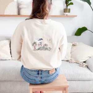 Sweater mit bestickter Kinderzeichnung